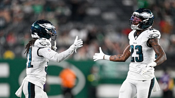 Aug 22, 2025; East Rutherford, New Jersey, USA; Philadelphia Eagles cornerback Eli Ricks (23) celebrates after the play with Philadelphia Eagles safety Andre' Sam (31) during the fourth quarter against the New York Jets at MetLife Stadium. Mandatory Credit: Mark Smith-Imagn Images