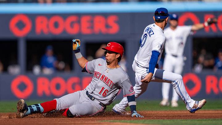 Sep 27, 2026; Toronto, Ontario, CAN; Cincinnati Reds third baseman Oswaldo Cabrera (16) slides into second base after hitting a double against the Toronto Blue Jays during the third inning at Rogers Centre. Mandatory Credit: Kevin Sousa-Imagn Images Sep 27, 2026; Toronto, Ontario, CAN; Cincinnati Reds third baseman Oswaldo Cabrera (16) slides into second base after hitting a double against the Toronto Blue Jays during the third inning at Rogers Centre. Mandatory Credit: Kevin Sousa-Imagn Images