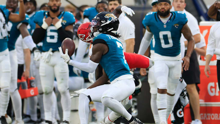 Jacksonville Jaguars wide receiver Brian Thomas Jr. (7) hauls in a reception against Kansas City Chiefs cornerback Joshua Williams (2) during the first quarter of a preseason NFL football game Saturday, Aug. 10, 2024 at EverBank Stadium in Jacksonville, Fla.