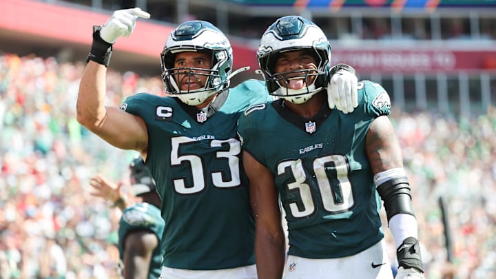 Sep 28, 2025; Tampa, Florida, USA; Philadelphia Eagles linebacker Jihaad Campbell (30) celebrates an interception with linebacker Zack Baun (53) during the second half against the Tampa Bay Buccaneers at Raymond James Stadium. Mandatory Credit: Kim Klement Neitzel-Imagn Images