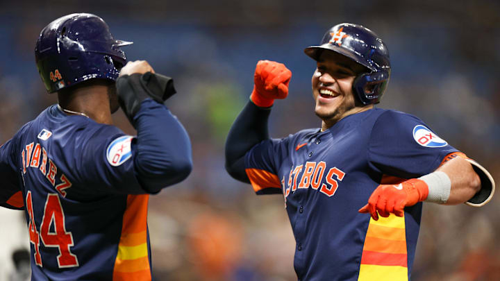 Aug 12, 2024; St. Petersburg, Florida, USA; Houston Astros catcher Yainer Diaz (21) celebrates with designated hitter Yordan Alvarez (44) after hitting a three run home run against the Tampa Bay Rays.