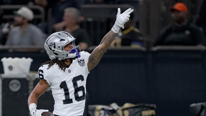 Dec 29, 2024; New Orleans, Louisiana, USA; Las Vegas Raiders wide receiver Jakobi Meyers (16) signals a first down against the New Orleans Saints at Caesars Superdome. Mandatory Credit: Matthew Hinton-Imagn Images