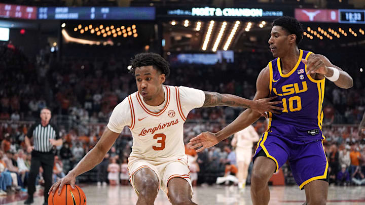 Texas Longhorns guard Dailyn Swain dribbles the ball against LSU Tigers forward Marquel Sutton during the first half at Moody Center. 