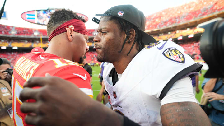 Sep 28, 2025; Kansas City, Missouri, USA; Baltimore Ravens quarterback Lamar Jackson (8) and Kansas City Chiefs quarterback Patrick Mahomes (15) greet each other on the field after the game at GEHA Field at Arrowhead Stadium. Mandatory Credit: Jay Biggerstaff-Imagn Images