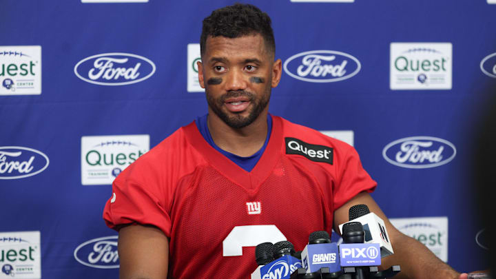 Jul 23, 2025: New York Giants quarterback Russell Wilson talks with media during training camp at Quest Diagnostics Training Center.