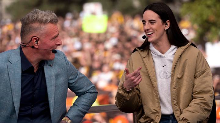 Pat McAfee listens to Caitlin Clark Oct. 3, 2026 during a live broadcast of ESPN’s “College GameDay” in downtown Iowa City, Iowa.