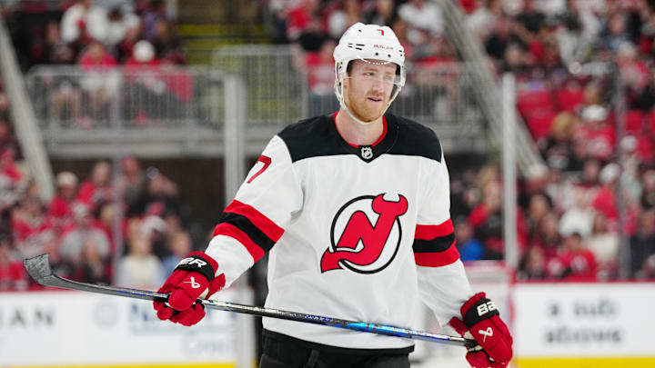 Apr 20, 2025; Raleigh, North Carolina, USA; New Jersey Devils defenseman Dougie Hamilton (7) looks on against the Carolina Hurricanes during the third period of game one of the first round of the 2025 Stanley Cup Playoffs at Lenovo Center. Mandatory Credit: James Guillory-Imagn Images Apr 20, 2025; Raleigh, North Carolina, USA; New Jersey Devils defenseman Dougie Hamilton (7) looks on against the Carolina Hurricanes during the third period of game one of the first round of the 2025 Stanley Cup Playoffs at Lenovo Center. Mandatory Credit: James Guillory-Imagn Images