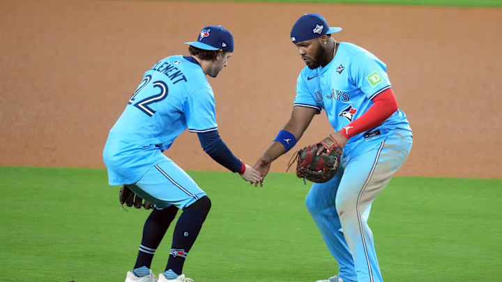 Blue Jays first baseman Vladimir Guerrero Jr. (celebrates with third baseman Ernie Clement after defeating the Los Angeles Dodgers in game five of the 2025 MLB World Series at Dodger Stadium. 