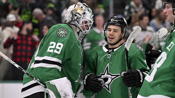 Jan 24, 2025; Dallas, Texas, USA; Dallas Stars goaltender Jake Oettinger (29) and center Logan Stankoven (11) celebrate the win over the Vegas Golden Knights at the American Airlines Center. Mandatory Credit: Jerome Miron-Imagn Images