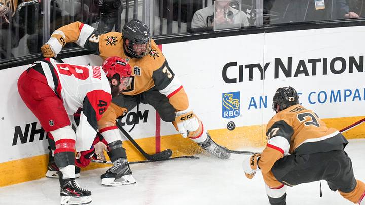 Jun 6, 2026; Las Vegas, Nevada, USA; Carolina Hurricanes left wing Jordan Martinook (48) goes after the puck against Vegas Golden Knights defenseman Brayden McNabb (3) and defenseman Shea Theodore (27) during the first period in game three of the 2026 Stanley Cup Final at T-Mobile Arena. Mandatory Credit: Lucas Peltier-Imagn Images Jun 6, 2026; Las Vegas, Nevada, USA; Carolina Hurricanes left wing Jordan Martinook (48) goes after the puck against Vegas Golden Knights defenseman Brayden McNabb (3) and defenseman Shea Theodore (27) during the first period in game three of the 2026 Stanley Cup Final at T-Mobile Arena. Mandatory Credit: Lucas Peltier-Imagn Images