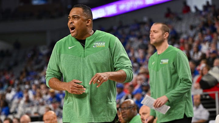 Mar 11, 2023; Fort Worth, TX, USA; Tulane Green Wave head coach Ron Hunter yells to his team during the first half against the Memphis Tigers at Dickies Arena. Mar 11, 2023; Fort Worth, TX, USA; Tulane Green Wave head coach Ron Hunter yells to his team during the first half against the Memphis Tigers at Dickies Arena.