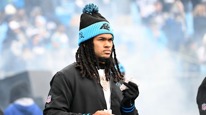 Dec 15, 2024; Charlotte, North Carolina, USA;  Carolina Panthers running back Jonathon Brooks (24) walk on to the field before the game at Bank of America Stadium. Mandatory Credit: Bob Donnan-Imagn Images