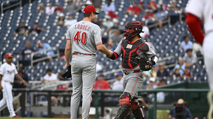 Jul 23, 2025; Washington, District of Columbia, USA; Cincinnati Reds starting pitcher Nick Lodolo (40) is congratulated by catcher Jose Trevino (35) after throwing a complete game shutout against the Washington Nationals at Nationals Park. Mandatory Credit: Brad Mills-Imagn Images