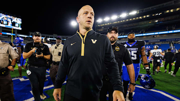 Vanderbilt Commodores head coach Clark Lea walks off the field after a game against the Kentucky Wildcats at Kroger Field. Vanderbilt Commodores head coach Clark Lea walks off the field after a game against the Kentucky Wildcats at Kroger Field.