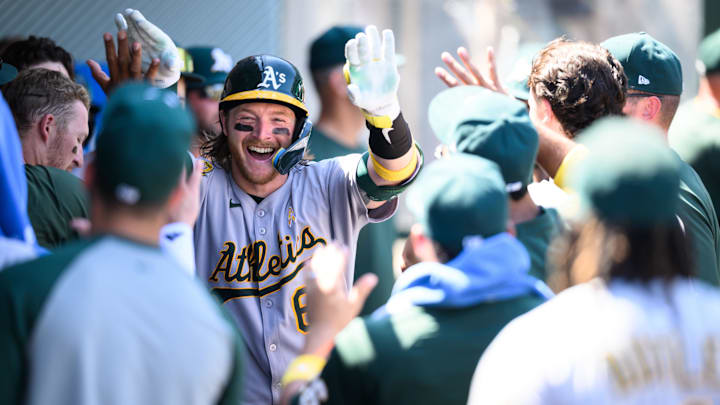 Sep 7, 2025; Anaheim, California, USA; Athletics catcher Willie MacIver (65) is greeted by teammates after hitting a home run against the Los Angeles Angels during the third inning at Angel Stadium. Mandatory Credit: William Liang-Imagn Images