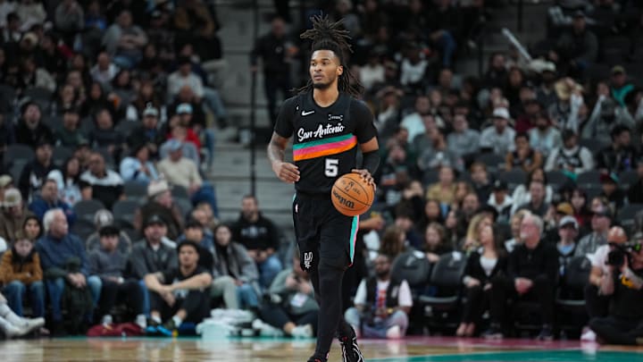Dec 29, 2025; San Antonio, Texas, USA; San Antonio Spurs guard Stephon Castle (5) brings the ball up the court in the second half against the Cleveland Cavaliers at Frost Bank Center. Dec 29, 2025; San Antonio, Texas, USA; San Antonio Spurs guard Stephon Castle (5) brings the ball up the court in the second half against the Cleveland Cavaliers at Frost Bank Center.