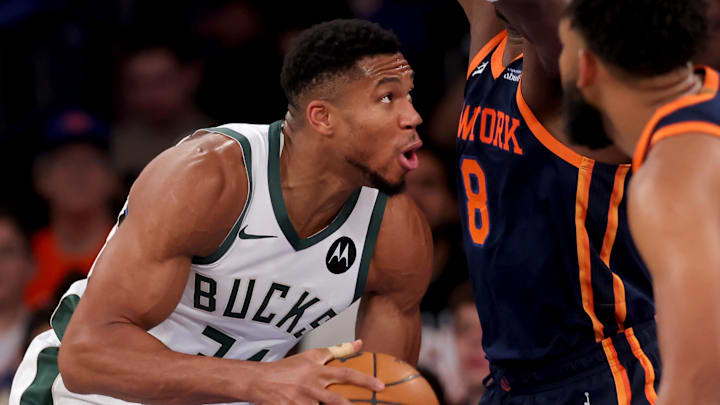 Nov 8, 2024; New York, New York, USA; Milwaukee Bucks forward Giannis Antetokounmpo (34) looks to shoot the ball against New York Knicks forward OG Anunoby (8) and center Karl-Anthony Towns (32) during the third quarter at Madison Square Garden. Mandatory Credit: Brad Penner-Imagn Images