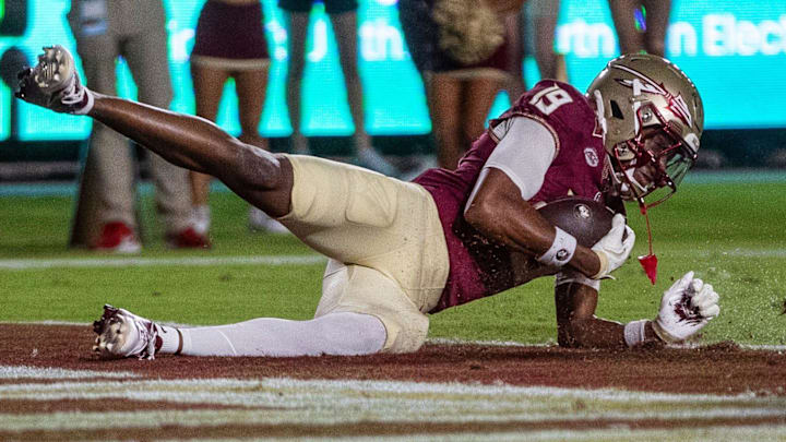 Florida State Seminoles wide receiver Micahi Danzy (19) scores a touchdown. The Miami Hurricanes defeated the Florida State Seminoles 22-28 at Doak Campbell Stadium on Saturday, Oct. 4, 2025.