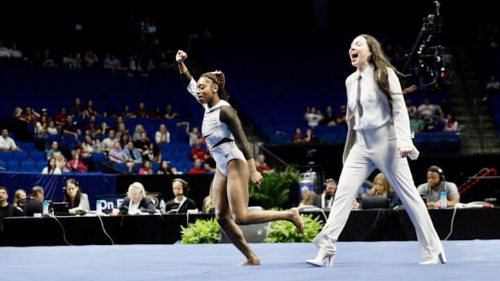 Missouri gymnast Hannah Horton celebrates after her routine at the SEC Championship at the BOK Center in Tulsa, Oklahoma. Horton won the vault title in Session I with a 9.950. Missouri gymnast Hannah Horton celebrates after her routine at the SEC Championship at the BOK Center in Tulsa, Oklahoma. Horton won the vault title in Session I with a 9.950.