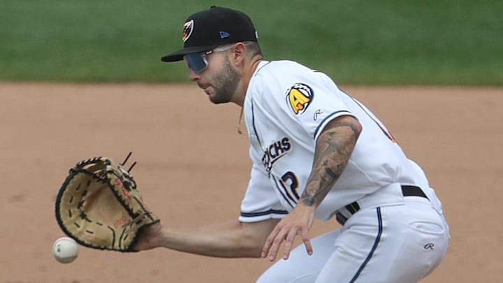 Akron RubberDucks first baseman CJ Kayfus fields a grounder against the Harrisburg Senators on Tuesday, Aug. 20, 2024, at Canal Park.