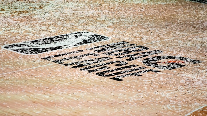 Mar 11, 2021; Orlando, Florida, USA; The NBA G League logo is covered in confetti after the Final between the Delaware Blue Coats and the Lakeland Magic at AdventHealth Arena. Mandatory Credit: Mary Holt-Imagn Images