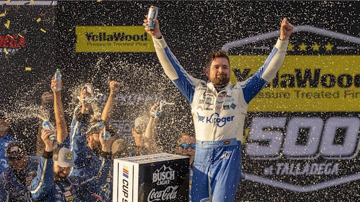 Oct 6, 2024; Talladega, Alabama, USA; Ricky Stenhouse, Jr. (47) celebrates a win in Victory Lane after the YellaWood 500 at Talladega Superspeedway.