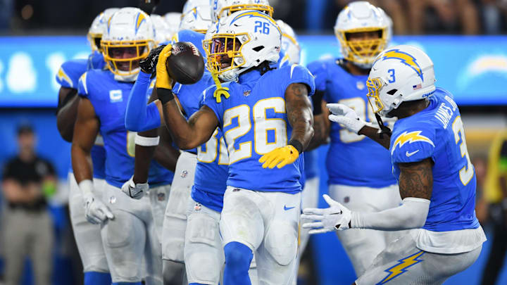 Oct 29, 2023; Inglewood, California, USA; Los Angeles Chargers cornerback Asante Samuel Jr. (26) celebrates with other teammates after Chicago Bears failed attempt on fourth down during third quarter at SoFi Stadium. Mandatory Credit: Jonathan Hui-Imagn Images