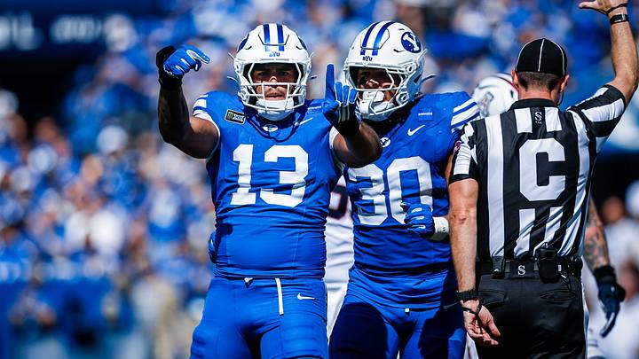 BYU defensive end Tausili Akana gets a sack against Arizona BYU defensive end Tausili Akana gets a sack against Arizona