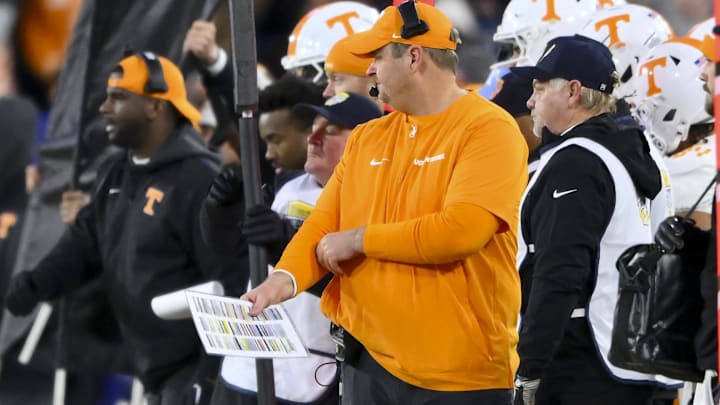 Dec 30, 2025; Nashville, TN, USA; Tennessee Volunteers head coach Josh Heupel watches his team against the Illinois Fighting Illini during the first half at Nissan Stadium. Mandatory Credit: Steve Roberts-Imagn Images Dec 30, 2025; Nashville, TN, USA; Tennessee Volunteers head coach Josh Heupel watches his team against the Illinois Fighting Illini during the first half at Nissan Stadium. Mandatory Credit: Steve Roberts-Imagn Images
