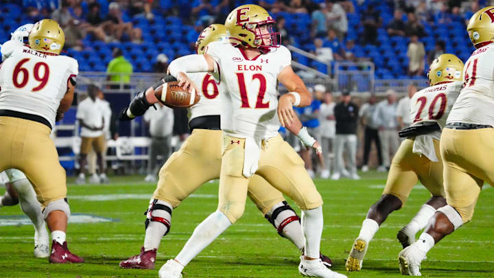 Former Elon Phoenix quarterback Matthew Downing fires in a game against Duke. Former Elon Phoenix quarterback Matthew Downing fires in a game against Duke.