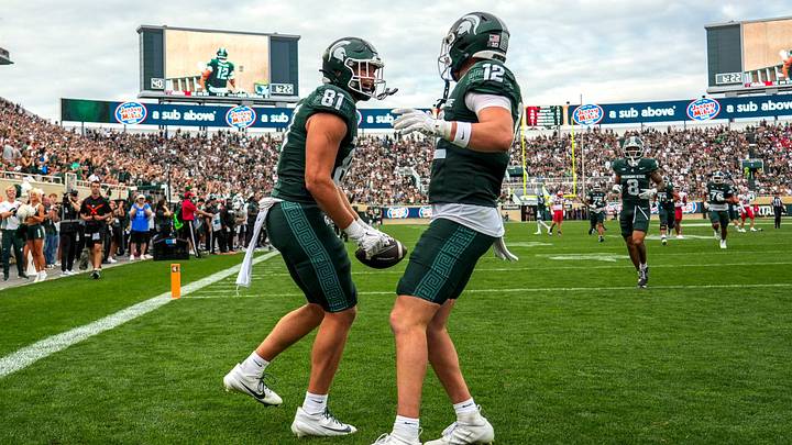 Michigan State's Michael Masunas, left, celebrates his touchdown catch with Jack Velling against Youngstown State during the third quarter on Saturday, Sept. 13, 2025, at Spartan Stadium in East Lansing. Michigan State's Michael Masunas, left, celebrates his touchdown catch with Jack Velling against Youngstown State during the third quarter on Saturday, Sept. 13, 2025, at Spartan Stadium in East Lansing.