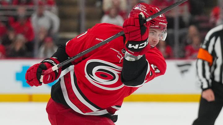 Mar 12, 2026; Raleigh, North Carolina, USA; Carolina Hurricanes defenseman Alexander Nikishin (21) takes a shot against the St. Louis Blues during the third period at Lenovo Center. Mandatory Credit: James Guillory-Imagn Images Mar 12, 2026; Raleigh, North Carolina, USA; Carolina Hurricanes defenseman Alexander Nikishin (21) takes a shot against the St. Louis Blues during the third period at Lenovo Center. Mandatory Credit: James Guillory-Imagn Images