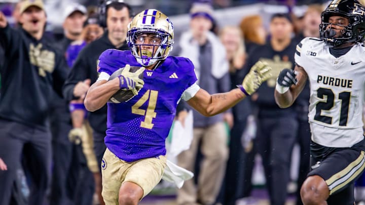 Jordan Washington breaks away from Purdue on a 68-yard scoring run.  