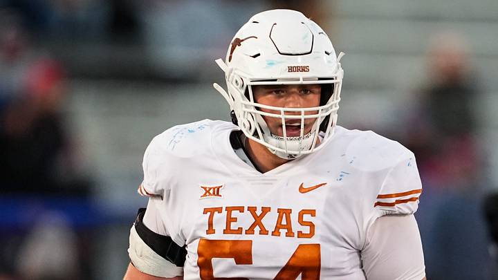 Texas Longhorns offensive lineman Cole Hutson (54) during the second half against the Kansas Jayhawks at David Booth Kansas Memorial Stadium. Texas Longhorns offensive lineman Cole Hutson (54) during the second half against the Kansas Jayhawks at David Booth Kansas Memorial Stadium.