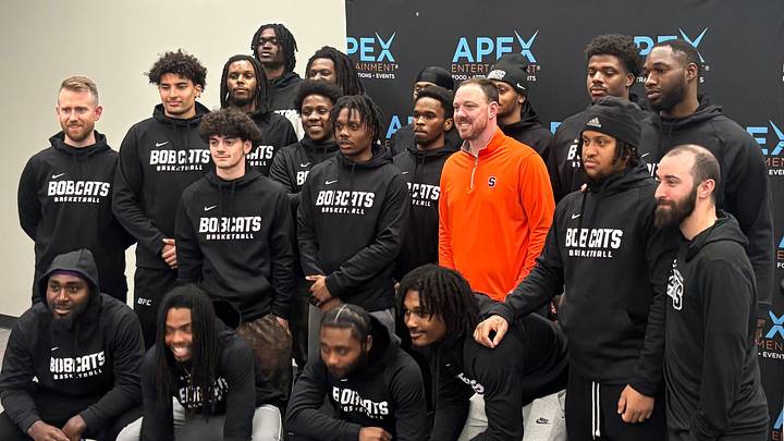 Syracuse head coach Gerry McNamara poses with members of the Bryant & Stratton College (Syracuse) Bobcats men's basketball team during a community meet-and-greet event at Apex Entertainment inside Destiny USA on Thursday, Oct. 15, 2026. Syracuse head coach Gerry McNamara poses with members of the Bryant & Stratton College (Syracuse) Bobcats men's basketball team during a community meet-and-greet event at Apex Entertainment inside Destiny USA on Thursday, Oct. 15, 2026.