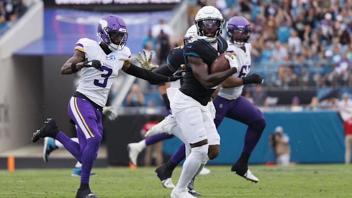 Nov 10, 2024; Jacksonville, Florida, USA; Jacksonville Jaguars safety Darnell Savage (6) makes an interception catch against the Minnesota Vikings during the third quarter at EverBank Stadium.