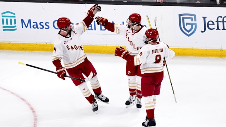 Boston College players huddle after Dean Letourneau's goal at TD Garden on Feb. 2, 2026.