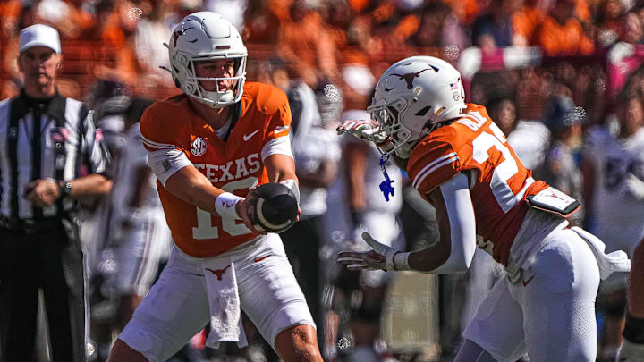 Texas Longhorns quarterback Arch Manning (16) hands the ball to running back Jaydon Blue (23) during the game against Mississippi State at Darrell K Royal-Texas Memorial Stadium in Austin Saturday, Sept. 28, 2024. Texas Longhorns quarterback Arch Manning (16) hands the ball to running back Jaydon Blue (23) during the game against Mississippi State at Darrell K Royal-Texas Memorial Stadium in Austin Saturday, Sept. 28, 2024.