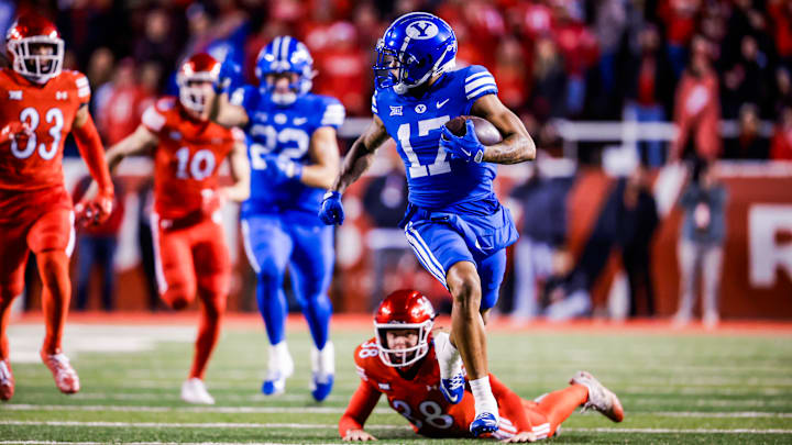BYU wide receiver Keelan Marion returns a kickoff for a touchdown against Utah