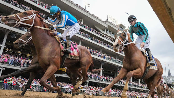 Mage, left, with Javier Castellano up, wins the 149th Running of the Kentucky Derby on May 6, 2023, at Churchill Downs.