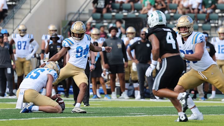 Aug 31, 2024; Honolulu, Hawaii, USA; UCLA Bruins place kicker Mateen Bhaghani (94) makes a field goal against the Hawaii Rainbow Warriors during the third quarter of an NCAA college football game against the UCLA Bruins at the Clarence T.C. Ching Athletics Complex. Mandatory Credit: Marco Garcia-Imagn Images