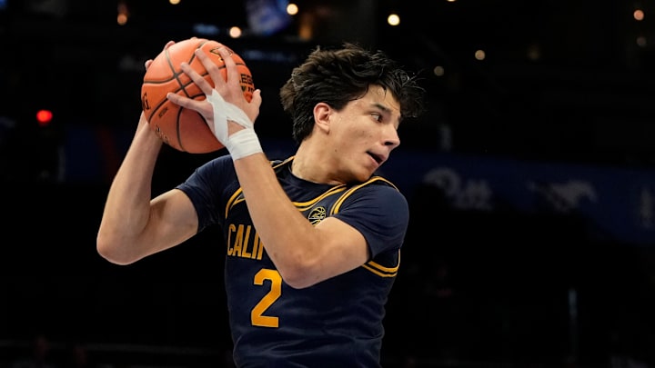 Mar 11, 2025; Charlotte, NC, USA; California Golden Bears guard Andrej Stojakovic (2) grabs a rebound in the first half at Spectrum Center. Mandatory Credit: Bob Donnan-Imagn Images
