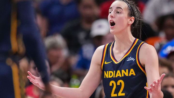 Indiana Fever guard Caitlin Clark (22) reacts to a call from the referee.