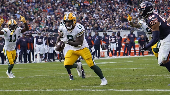 Nov 17, 2024; Chicago, Illinois, USA; Green Bay Packers running back Josh Jacobs (8) runs for a touchdown against the Chicago Bears during the second half at Soldier Field. Mandatory Credit: David Banks-Imagn Images