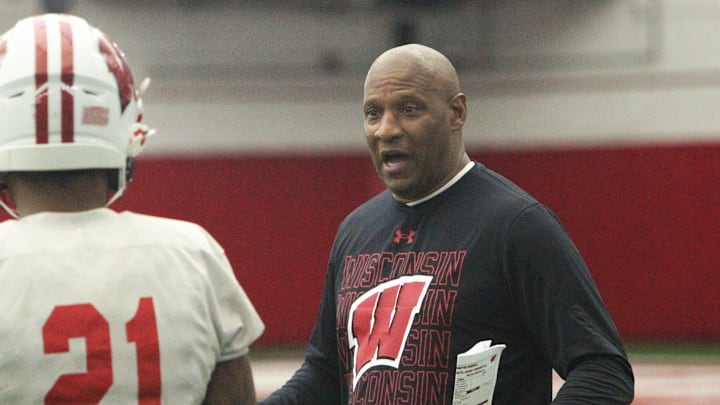 Wisconsin defensive backs coach Paul Haynes talks with Jonas Duclona during the team's 14th spring practice, which was held Tuesday morning April 30, 2024 at the McClain Center in Madison, Wisconsin.