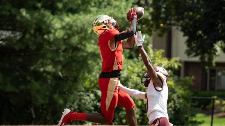Sept 2, 2023; Oradell, NJ, USA; Iona Prep (NY) at Bergen Catholic (NJ) in a high school football game on Saturday, Sept. 2, 2023. BC #0 Quincy Porter makes a catch for a touchdown in the second quarter as IP #3 Terron Johnson tries to break up the catch. Mandatory Credit: Michael Karas-The Record