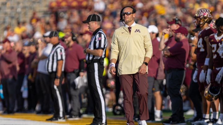 Sep 17, 2022; Minneapolis, Minnesota, USA; Minnesota Golden Gophers head coach P.J. Fleck watches a replay in the fourth quarter against the Colorado Buffaloes at Huntington Bank Stadium. Mandatory Credit: Matt Blewett-USA TODAY Sports Sep 17, 2022; Minneapolis, Minnesota, USA; Minnesota Golden Gophers head coach P.J. Fleck watches a replay in the fourth quarter against the Colorado Buffaloes at Huntington Bank Stadium. Mandatory Credit: Matt Blewett-USA TODAY Sports