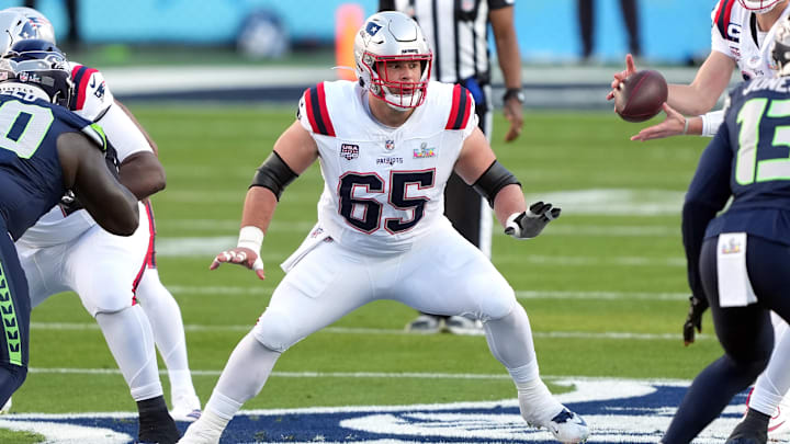 Feb 8, 2026; Santa Clara, CA, USA; New England Patriots center Garrett Bradbury (65) blocks against the Seattle Seahawks during the first quarter in Super Bowl LX at Levi's Stadium. Mandatory Credit: Darren Yamashita-Imagn Images