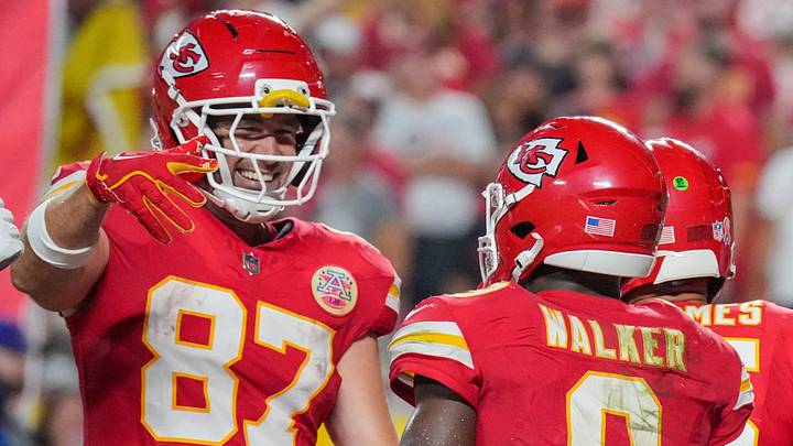 Sep 14, 2026; Kansas City, Missouri, USA; Kansas City Chiefs running back Kenneth Walker III (9) celebrates with tight end Travis Kelce (87) after he scores against the Denver Broncos during the game at GEHA Field at Arrowhead Stadium. Mandatory Credit: Denny Medley-Imagn Images