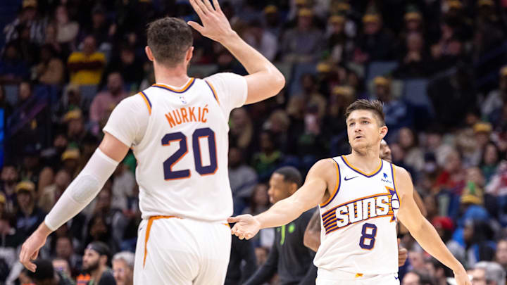 Jan 19, 2024; New Orleans, Louisiana, USA; Phoenix Suns guard Grayson Allen (8) slaps hands with Jan 19, 2024; New Orleans, Louisiana, USA; Phoenix Suns guard Grayson Allen (8) slaps hands with
